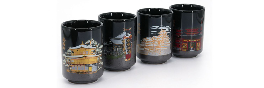 4 tasses noires avec des temples japonais peint dessus.
